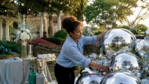 Event decorator arranging chrome balloons
