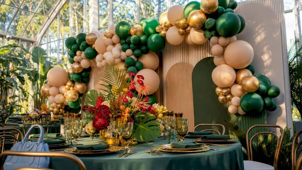 Special Occasion Balloon Ideas Guide for Every Event 1 Luxury emerald and gold balloon arch at Atlanta garden event