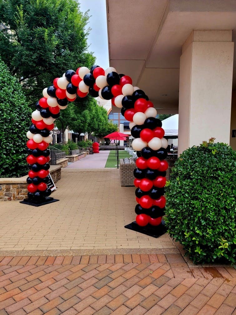 Balloon Decor Pricing 41 Luxury bridal shower featuring a custom arch backdrop with elegant pearl white organic balloon garland, specialty pearl balloons, and sophisticated tablescape styling for the "Blooming Into Mrs. Kelly" celebration. Designed by Atlanta Balloon Designer, this custom backdrop creates an elegant focal point for bridal showers and engagement celebrations. Atlanta balloon stylist specializing in balloon decorations, luxury balloon arches, custom backdrops, event décor, event rentals, floral styling, and upscale celebrations throughout Metro Atlanta.