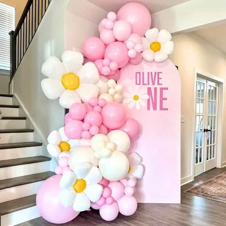 Decorative staircase balloon garland title card