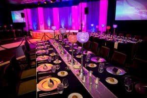 Corporate awards banquet balloon decor title card