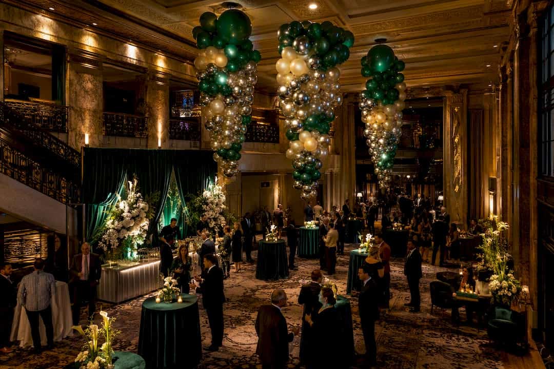 Avoid Rejection: Balloon Chandelier Installation for Atlanta Events Staggered balloon chandelier drops over event