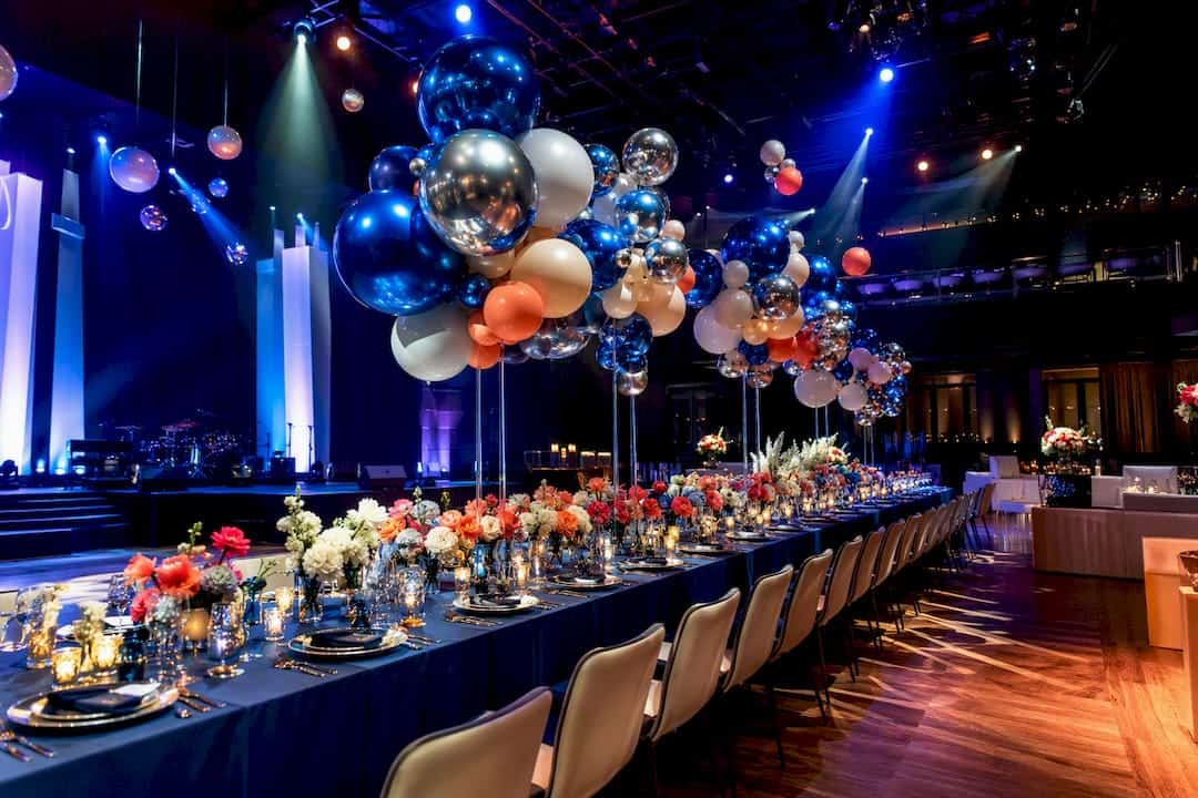 Planners: Book 3–8 Weeks for Interactive Balloon Installations Kinetic balloon centerpieces at corporate event