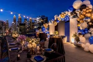 Luxury Atlanta rooftop event with material signage