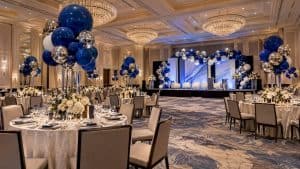 Corporate tables with sculptural balloon centerpieces